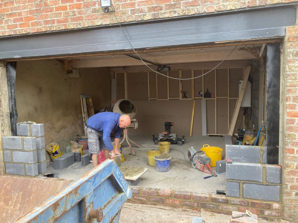 JGR Groundworks building a wall, ready to convert garage.